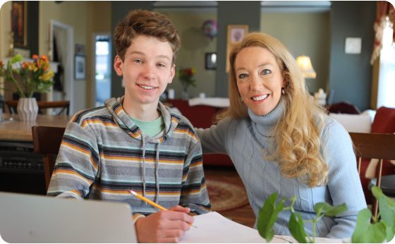 Mother and son doing homework together